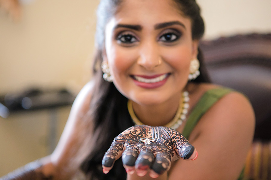 engagement ring shown on bridal henna
