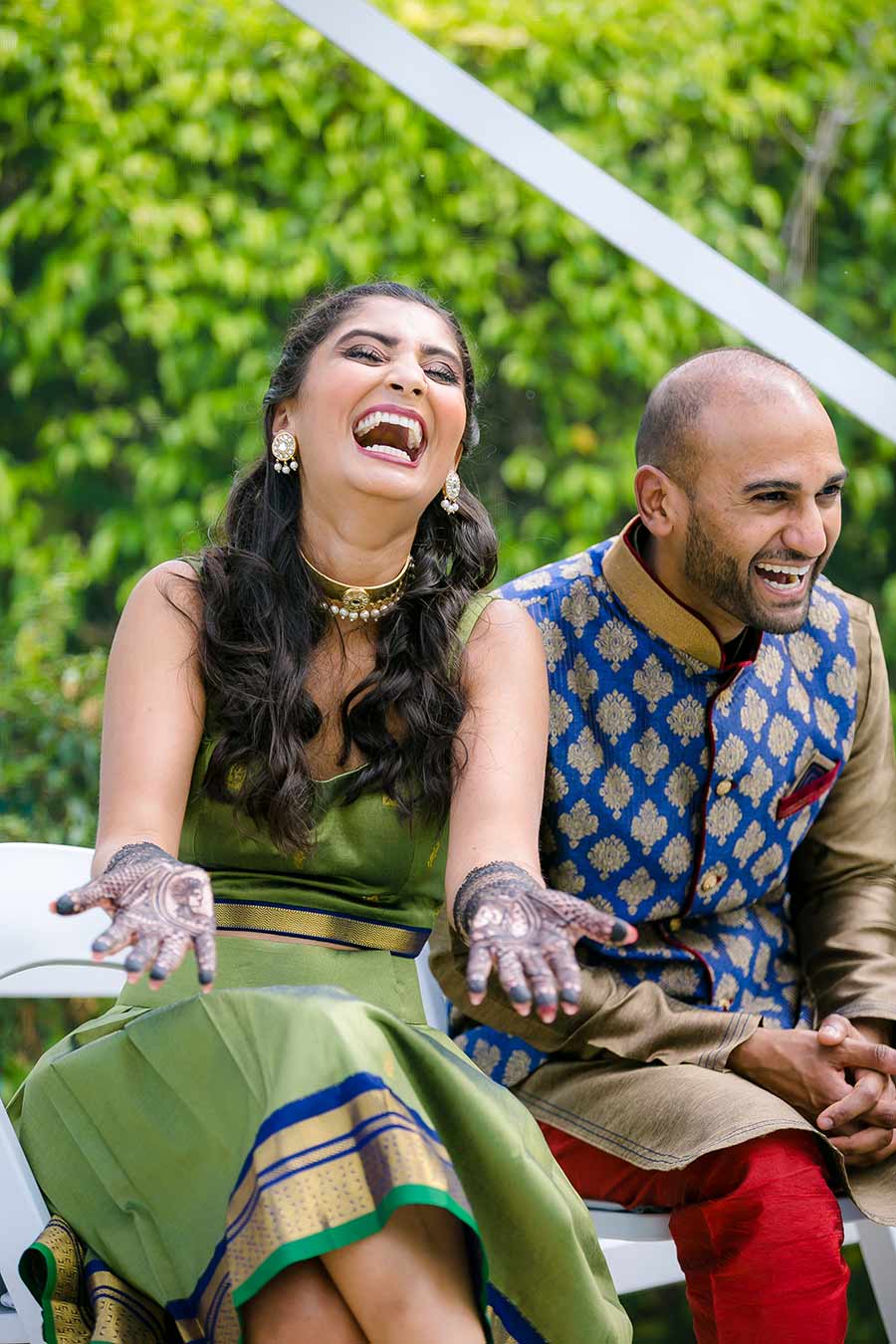 indian bride and groom with mehndi