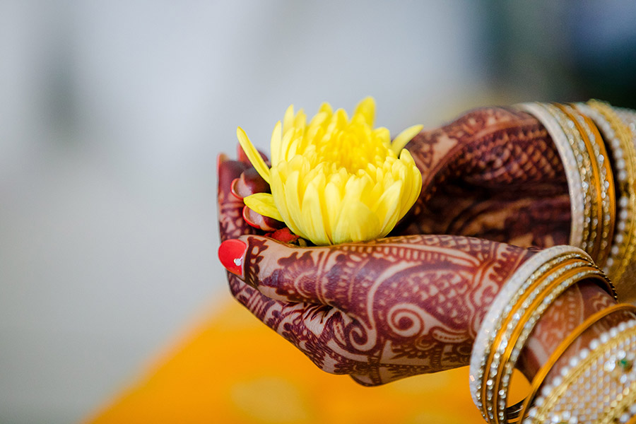 flower offering during indian wedding flower offering during indian wedding