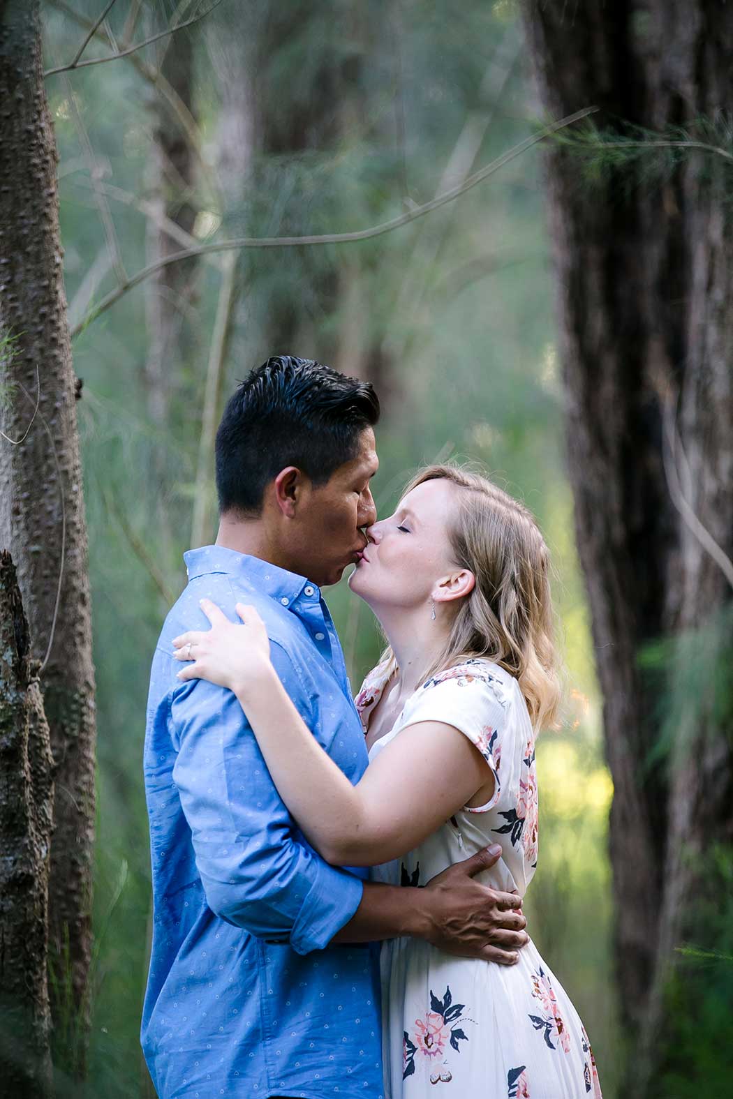 couple kissing during their engagement photoshoot