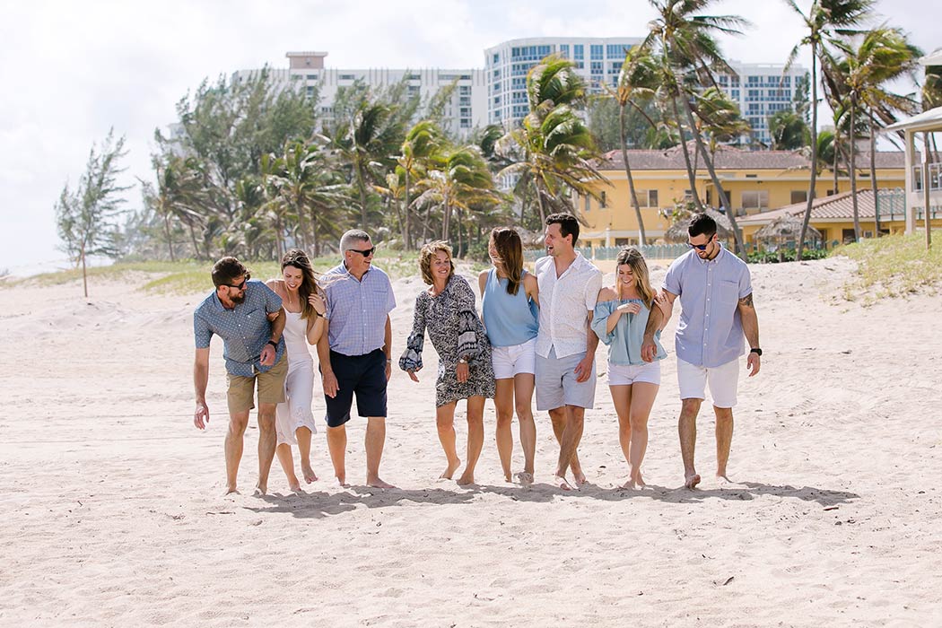fun family photoshoot session at the beach