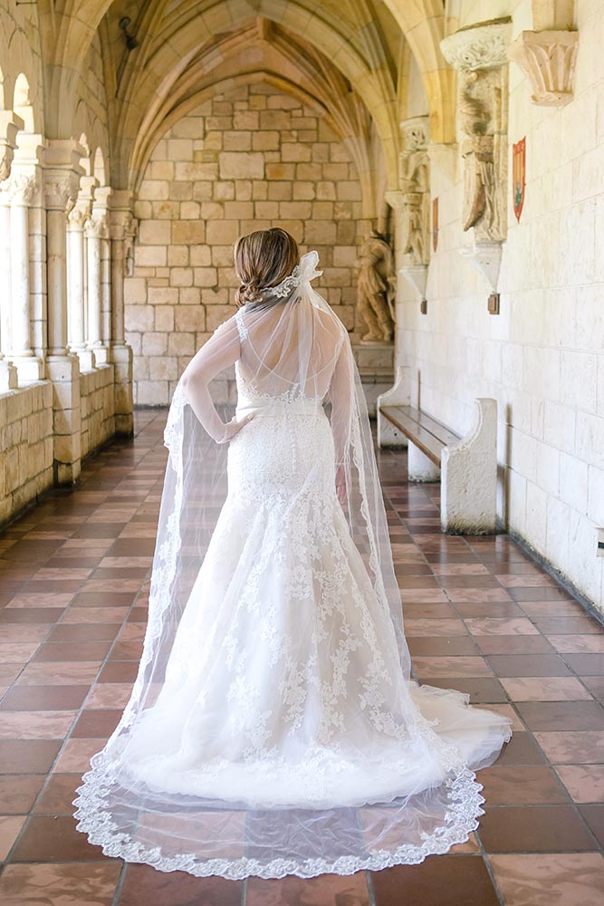 bride posing at ancient spanish monastery, miami | andrea harborne photography