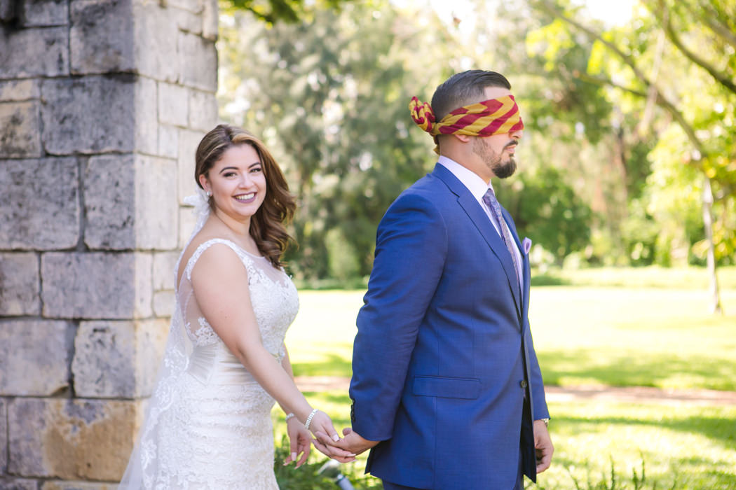 unique first look photograph ideas with groom wearing football scarf