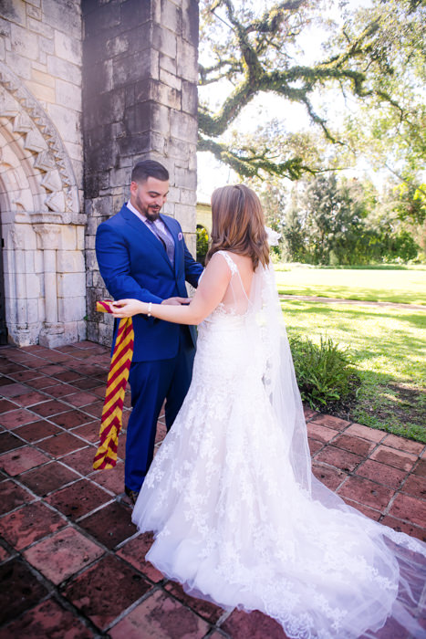 bride and groom first look at the ancient spanish monastery, miami | andrea harborne photography