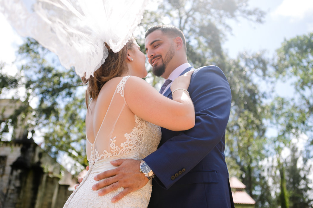 beautiful wedding photography of bride and groom with lace veil