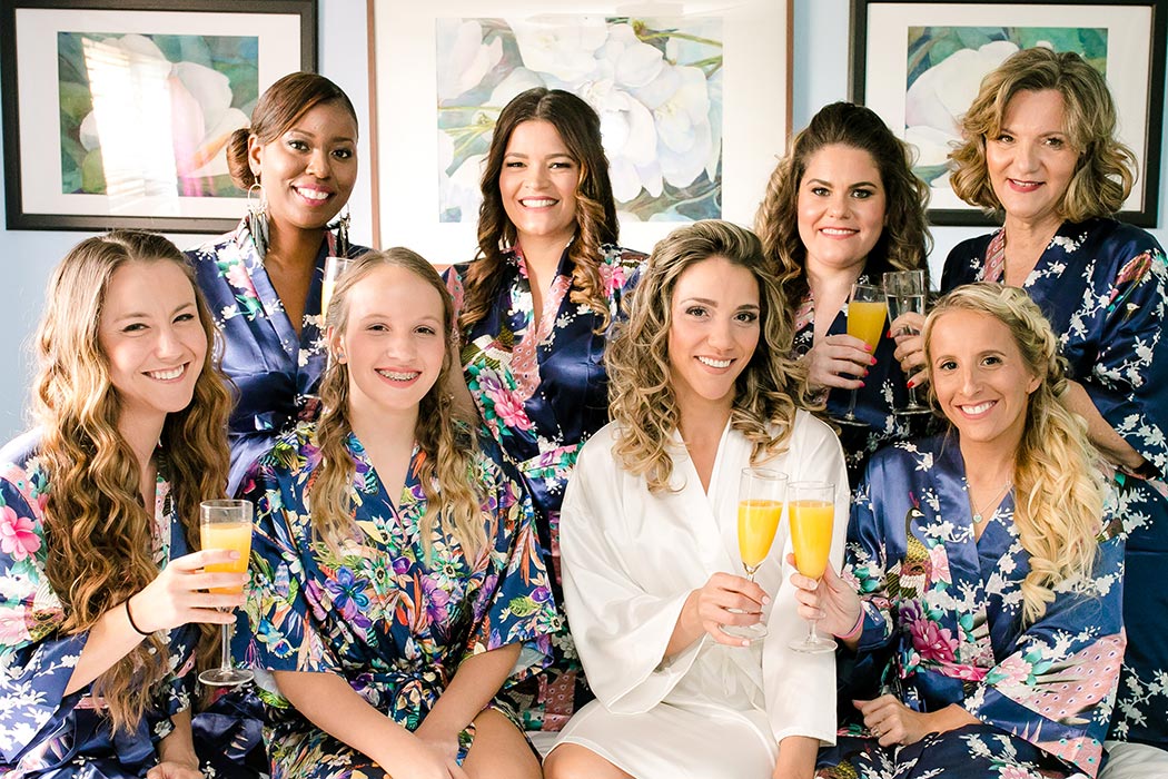 bride and her bridesmaids | bridesmaids and bride wedding robes | champagne