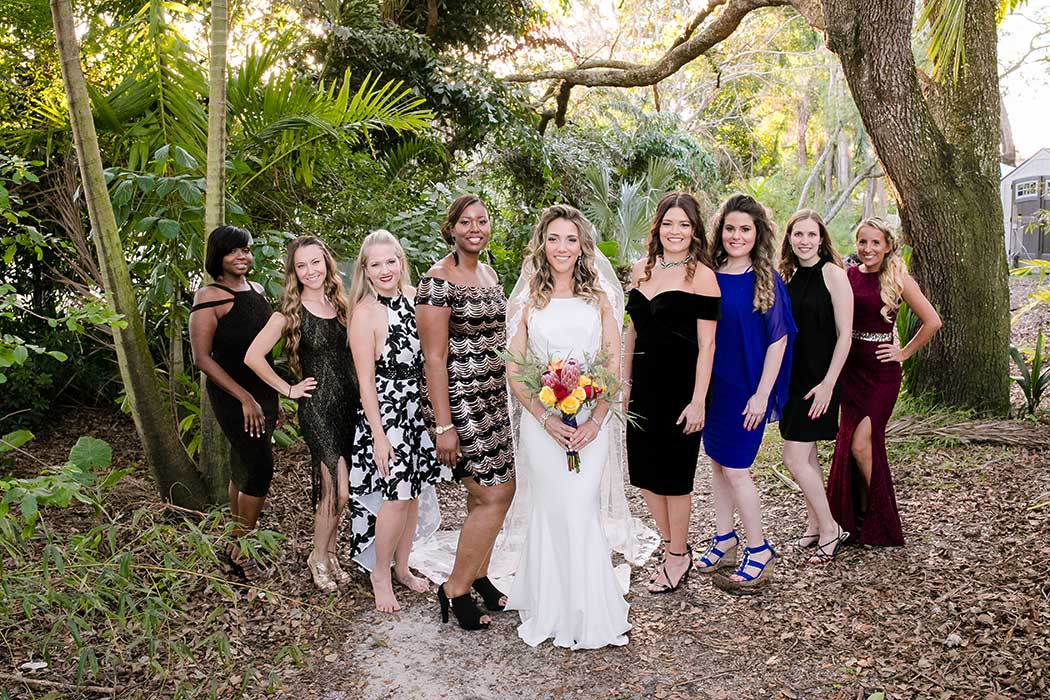 bride and her bridesmaids unique posing shot | modern wedding at living sculpture sanctuary