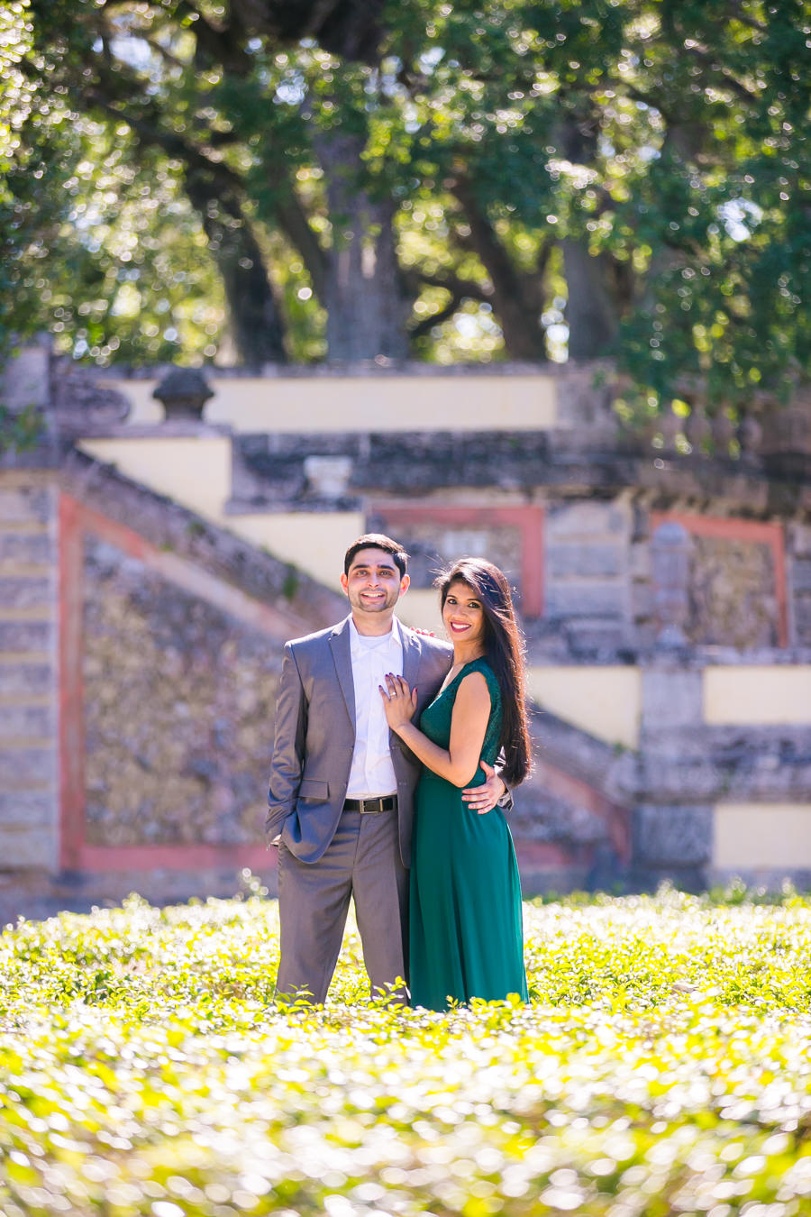 beautiful modern indian engagement photo shoot in vizcaya museum | long green dress