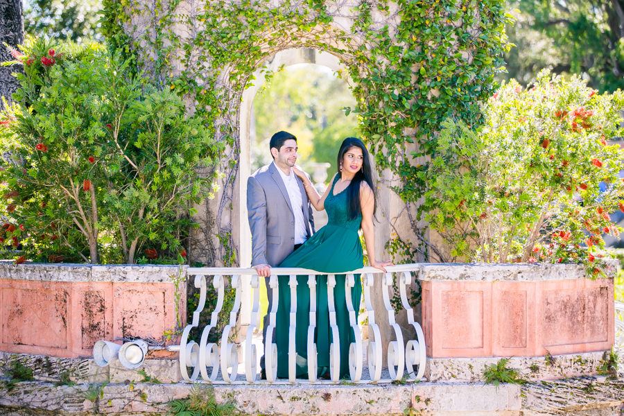 modern indian couple pose for engagement photoshoot at vizcaya museum in miami