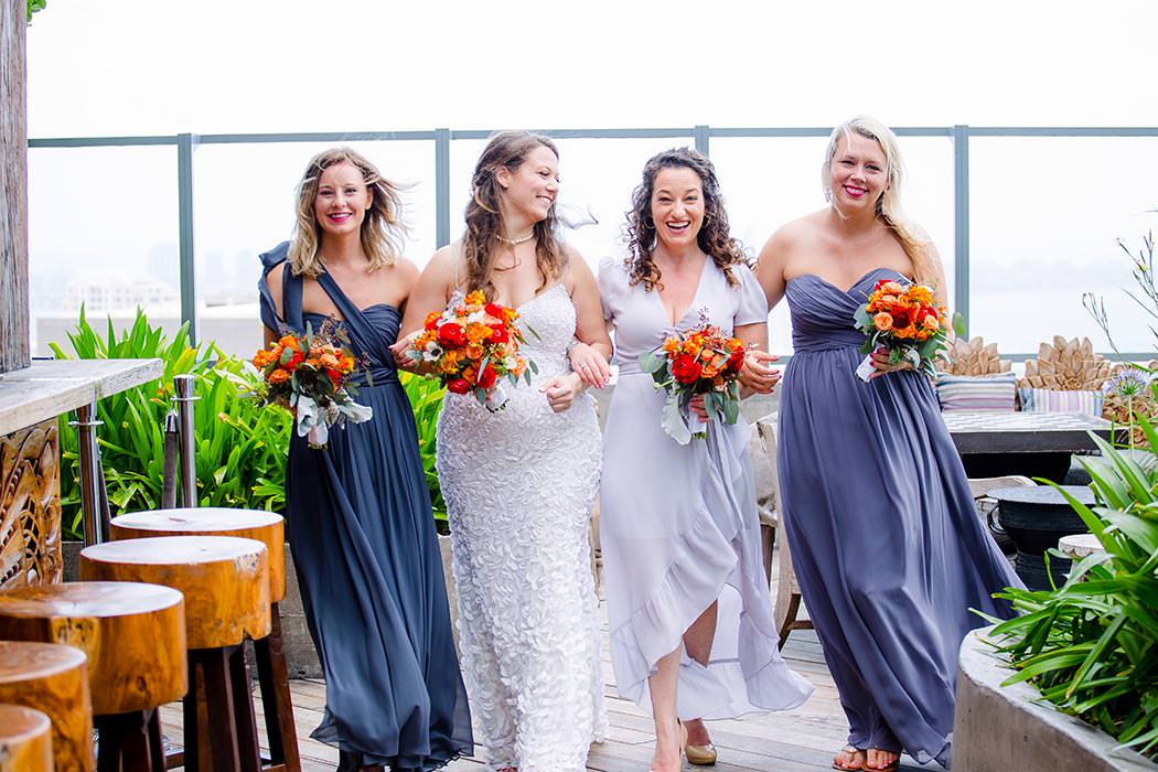 bride and bridesmaids have fun at east hotel miami wedding