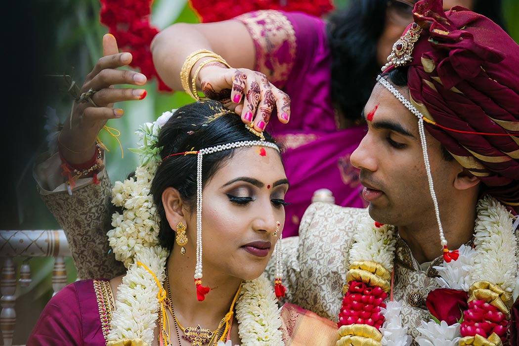 sindoor wedding ritual at bahia mar fort lauderdale with bride in gold and red sari