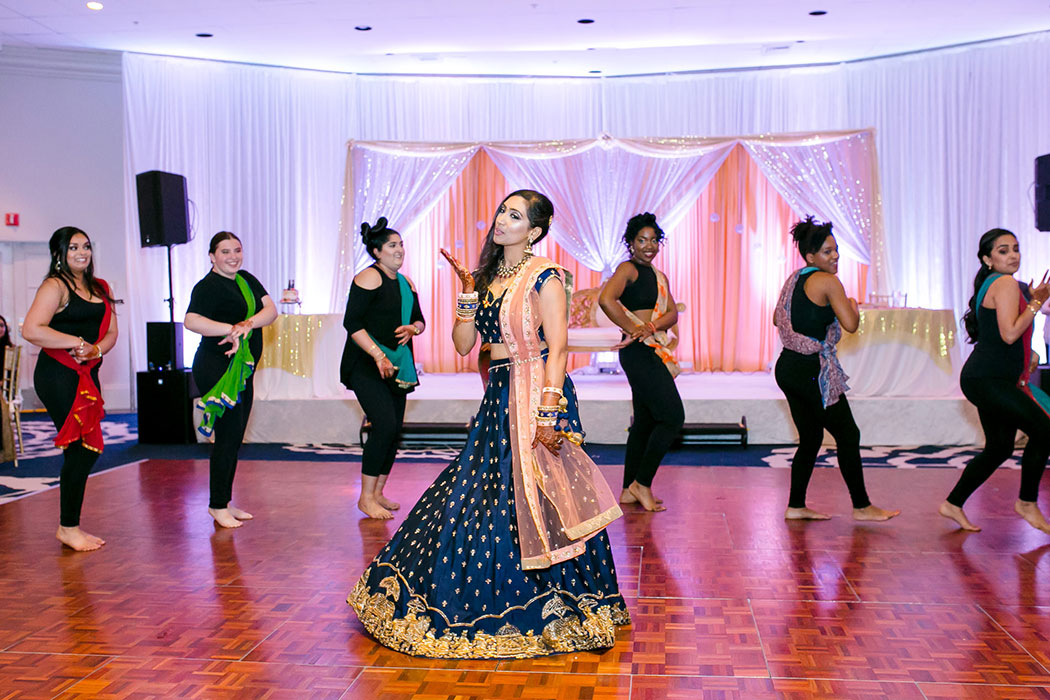 south florida indian wedding photographer | indian wedding reception dance performance at bahia mar fort lauderdale