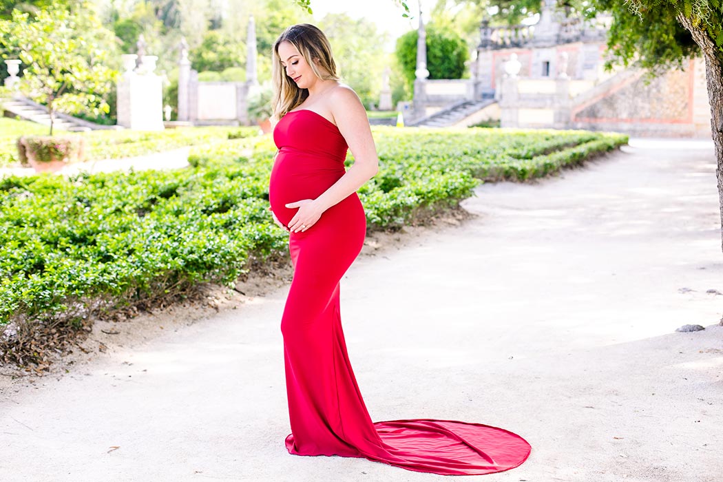 stunning red maternity dress for photoshoot at vizcaya | fort lauderdale maternity photographer