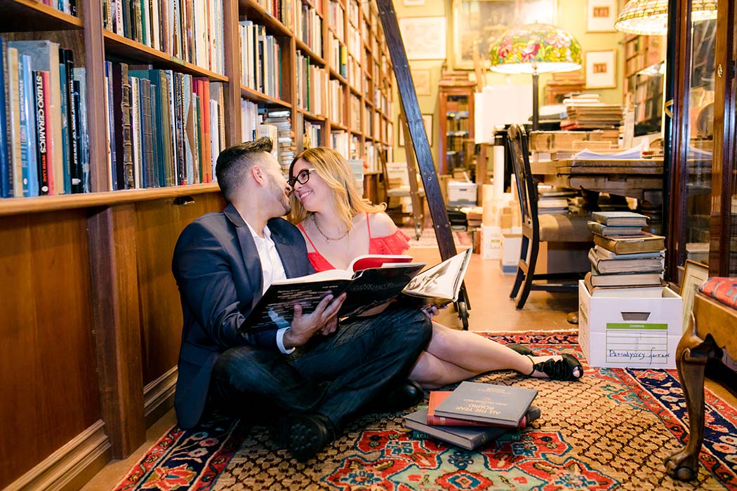 posing idea for book store engagement session in fort lauderdale