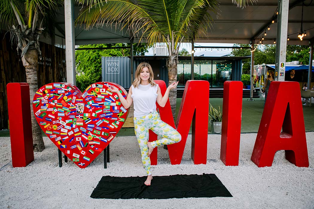 girl doing yoga pose during fun lifestyle photoshoot