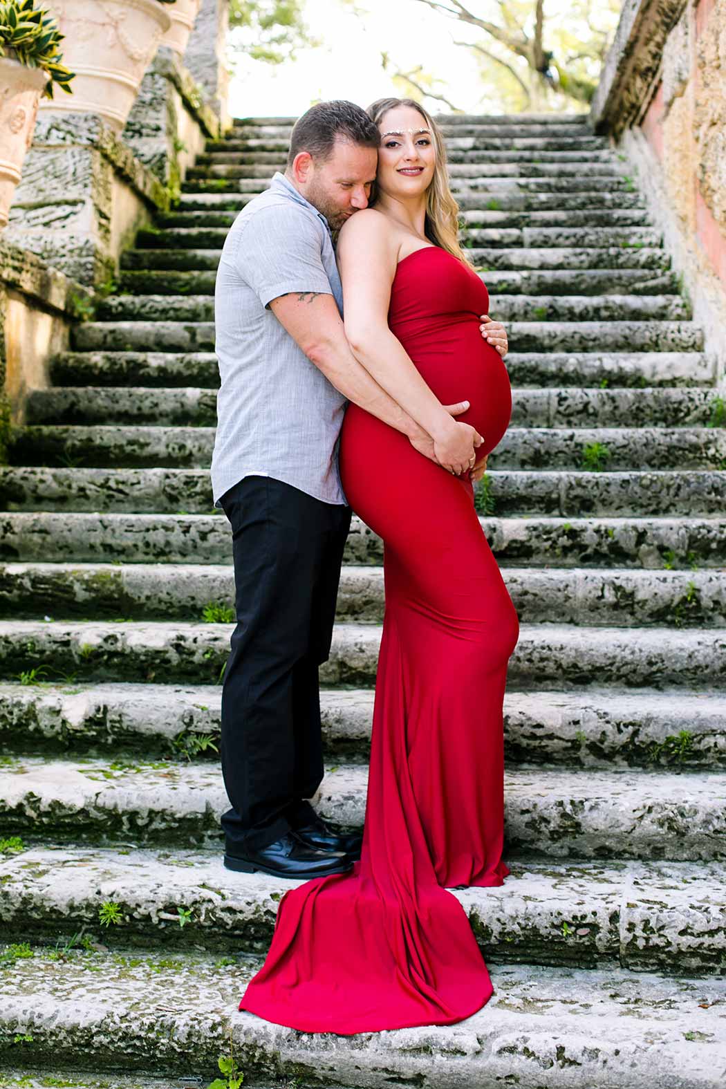 elegant long red maternity dress | vizcaya museum miami maternity photoshoot | fort lauderdale maternity photographer