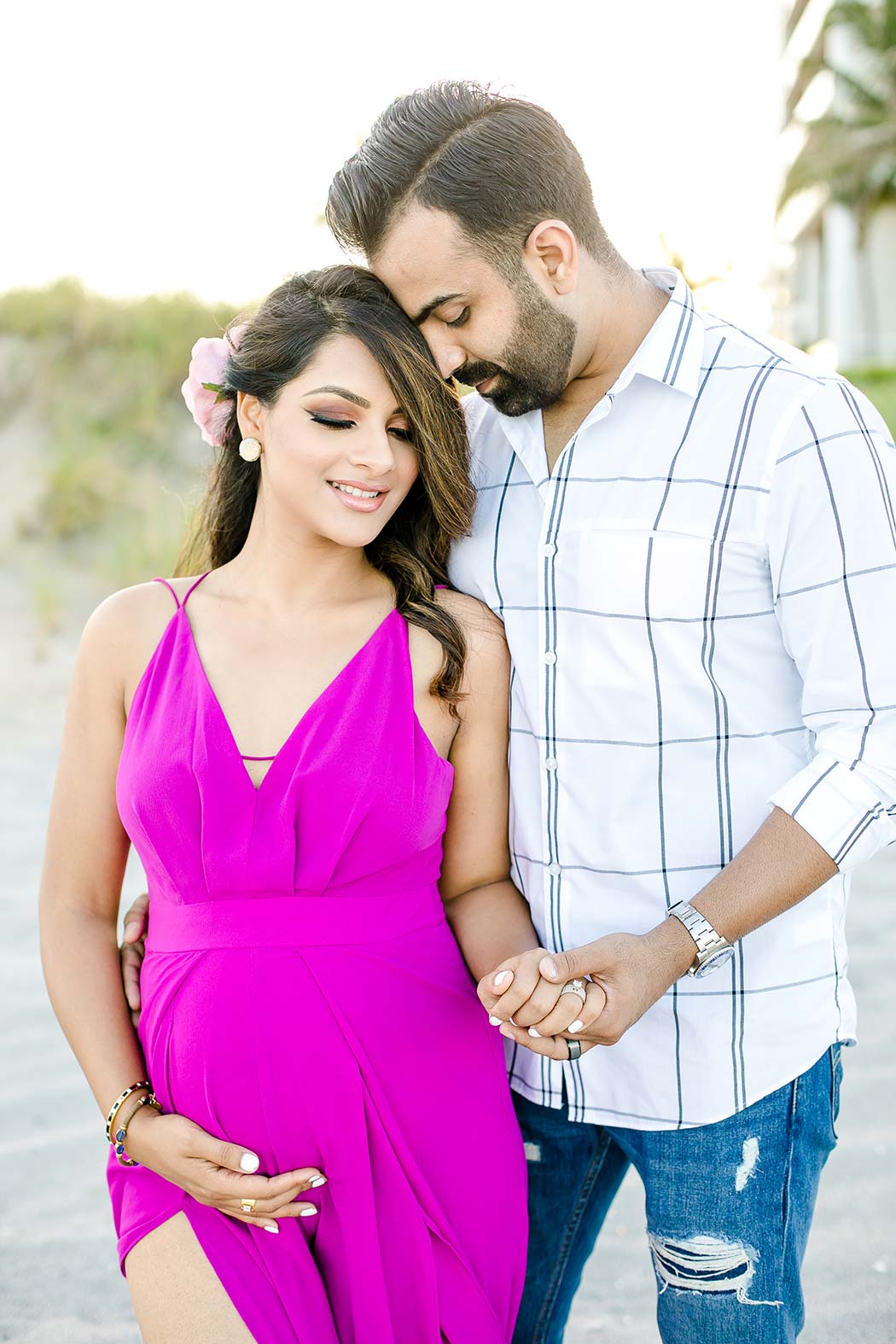 boca raton beach maternity photoshoot with couple | pink maternity dress