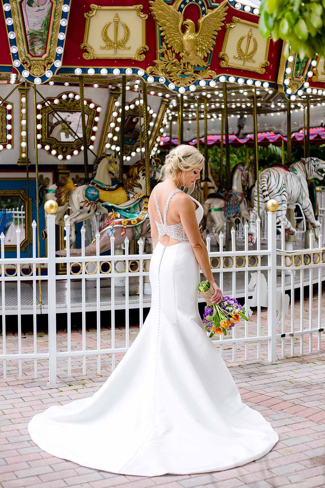 modern long ivory wedding dress with silver sleeve detail | palm beach zoo wedding
