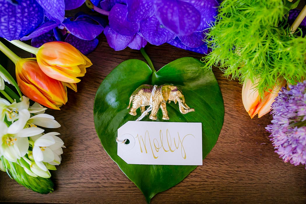 unique ideas for wedding name card holder | gold animal wedding name card holder