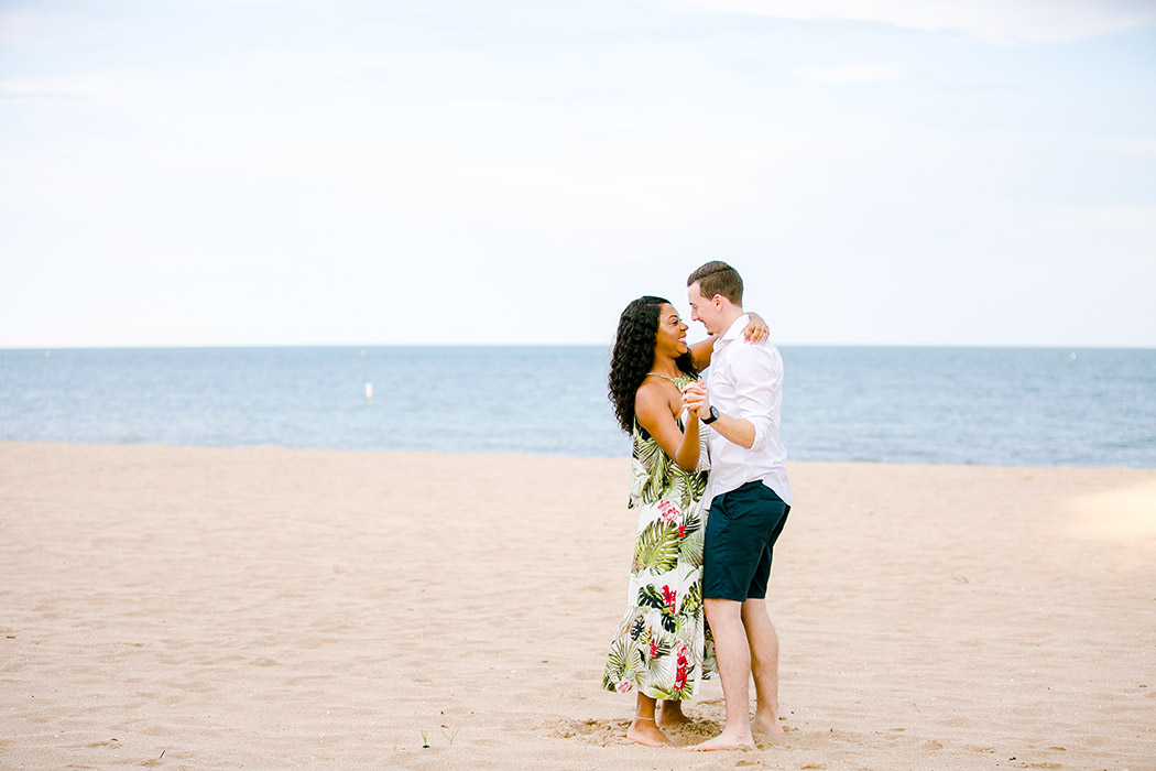 mixed race engagement photography session on pompano beach