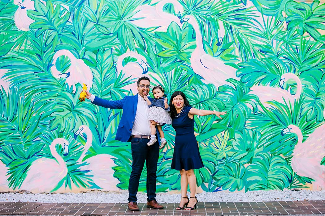 fun family photography session on las olas boulevard with flamingo mural wall | family photographer south florida