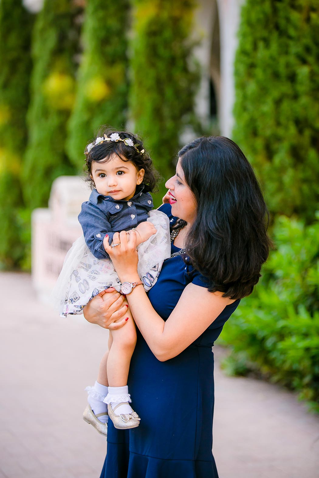 one year old indian girl and her mother posing for family photos in fort lauderdale | las olas boulevard family photography