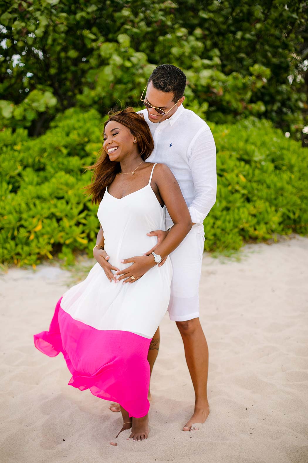 beach gender reveal photoshoot with pink smoke bomb | fort lauderdale maternity photographer